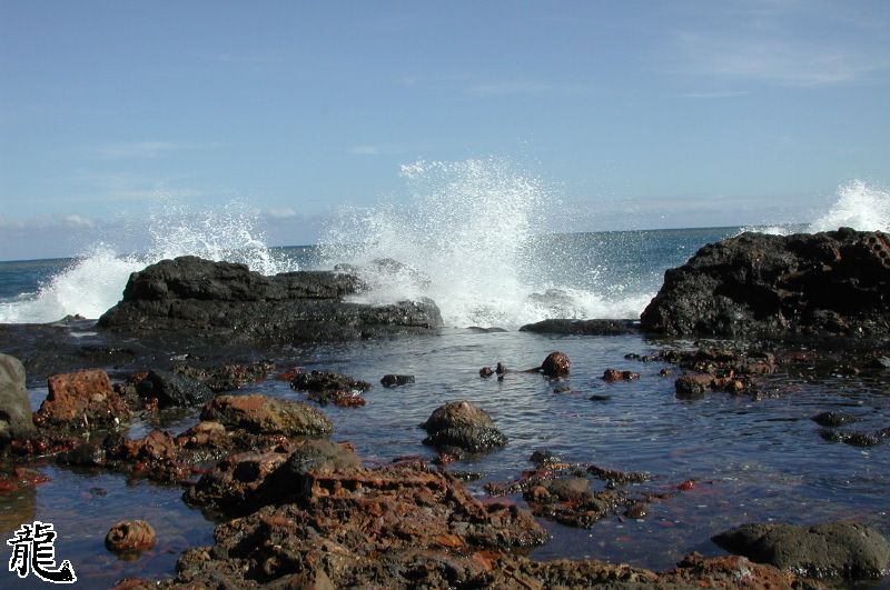Old rusty parts by shore line