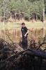 Ryan standing on a log